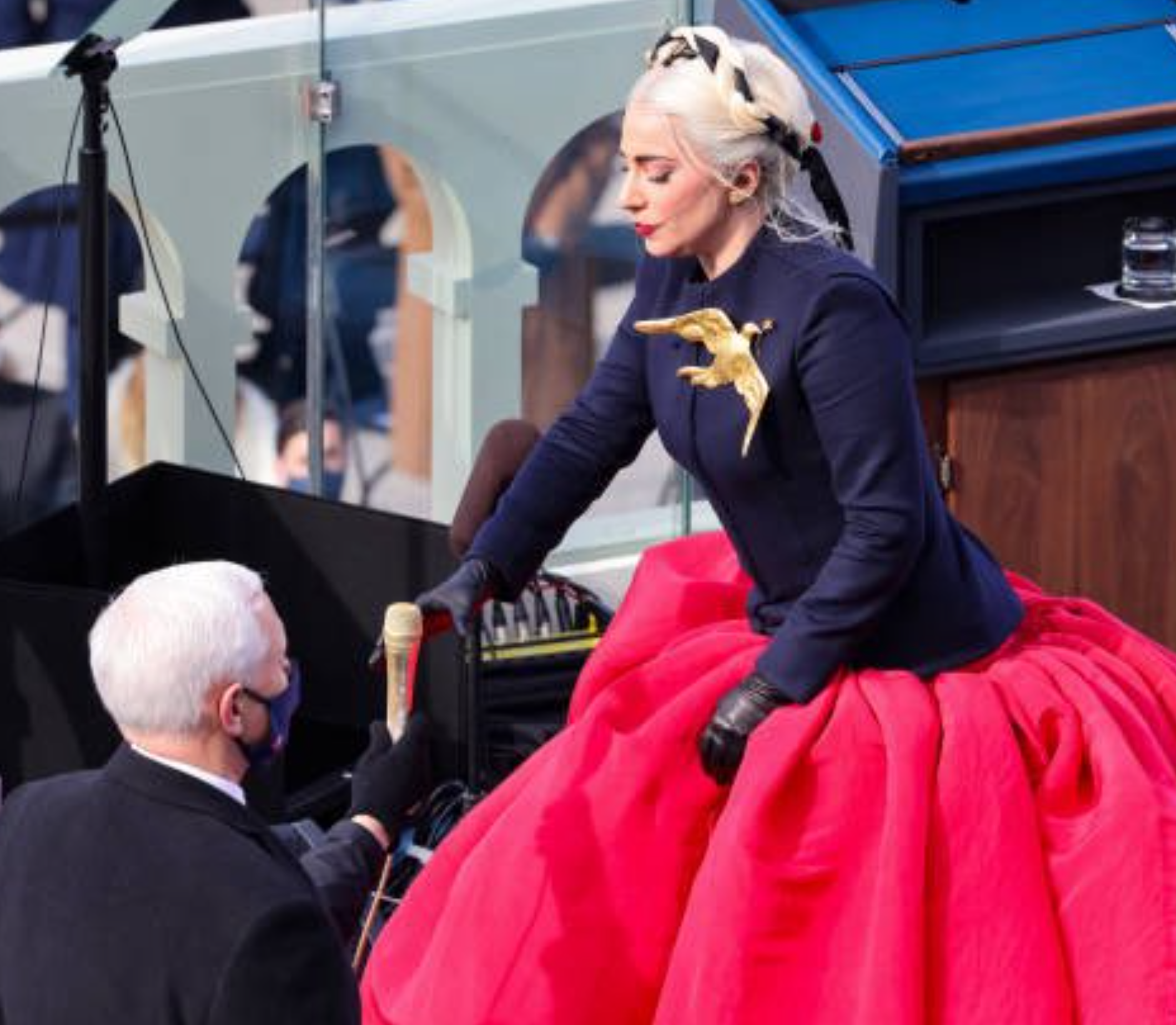 06 Lady Gaga looking down on Mike Pence.png
