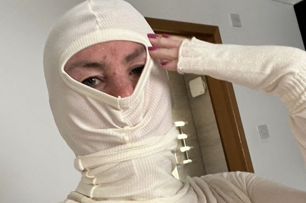 0_PAY-KNM_MUM_FORCED_TO_WEAR_BALACLAVA_2.jpg