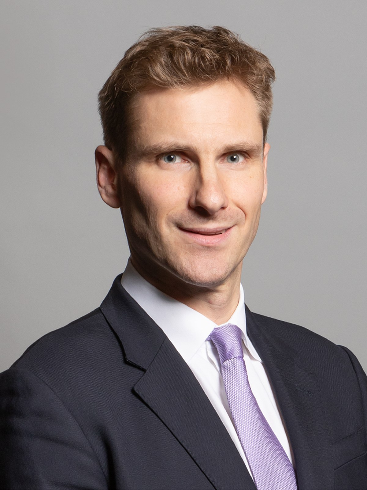 1200px-Official_portrait_of_Chris_Philp_MP_crop_2.jpg
