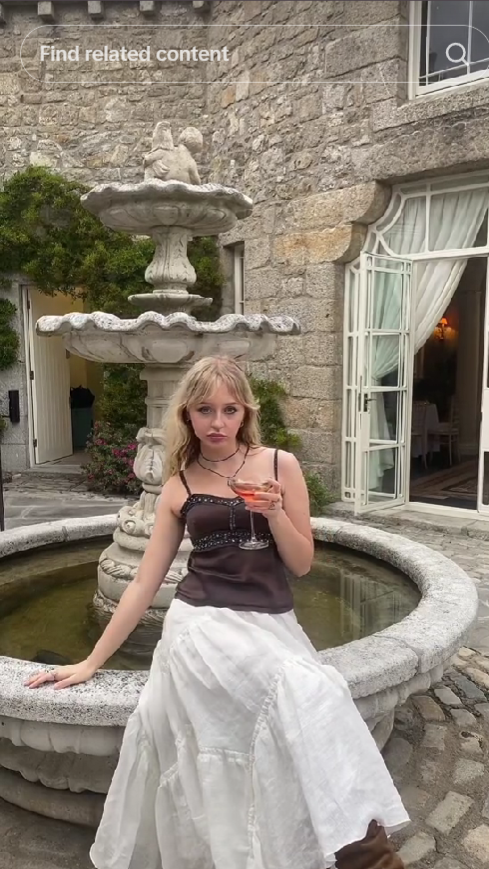 Enya's water fountain outdoors.png