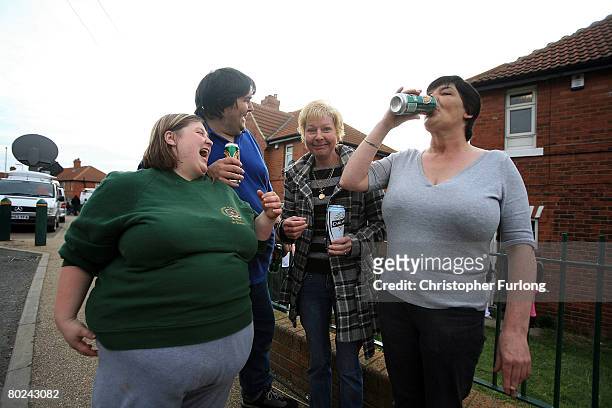 neighbours-and-friends-of-shannon-matthews-celebrate-her-re-appearance-outside-her-home-in.jpg