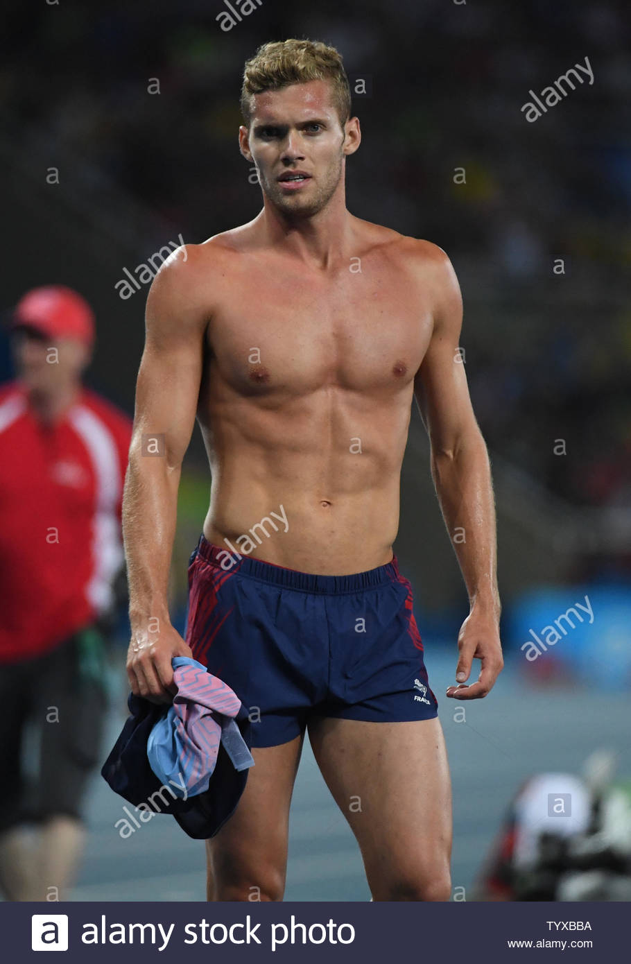 silver-medalist-kevin-mayer-of-france-takes-his-shirt-off-after-the-mens-decathlon-1500m-at-th...jpg