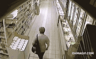 woman supermarket GIF