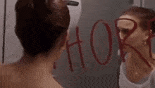 natalie-portman-wiping-mirror.gif