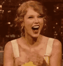 taylor-swift-laughing.gif