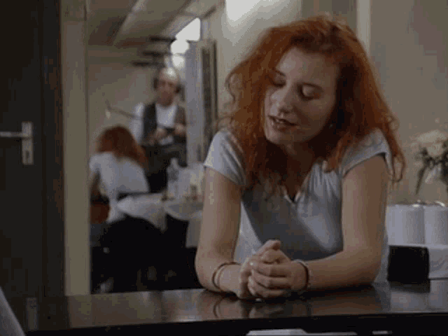 tori-amos-tori-amos-hands-on-head.gif