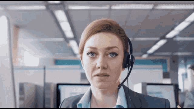 its-a-scam-barclays-lady-headphones.gif