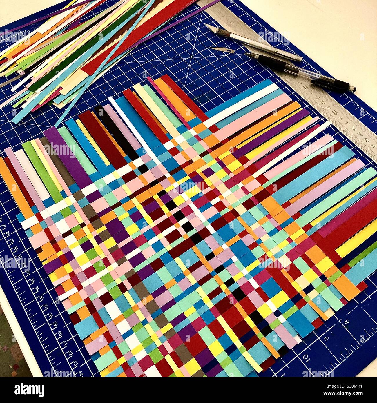 craftwork-with-coloured-paper-strips-woven-together-S30MR1.jpg