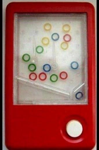 This may contain: a red electronic device with circles on it