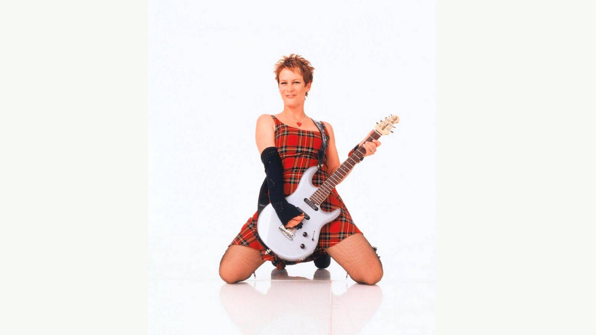 freaky-friday-jamie-lee-curtis-playing-guitar-mbyk2mqf03rq0owg.jpg