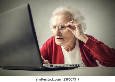 confused-grandmother-using-pc-260nw-239507347.jpg